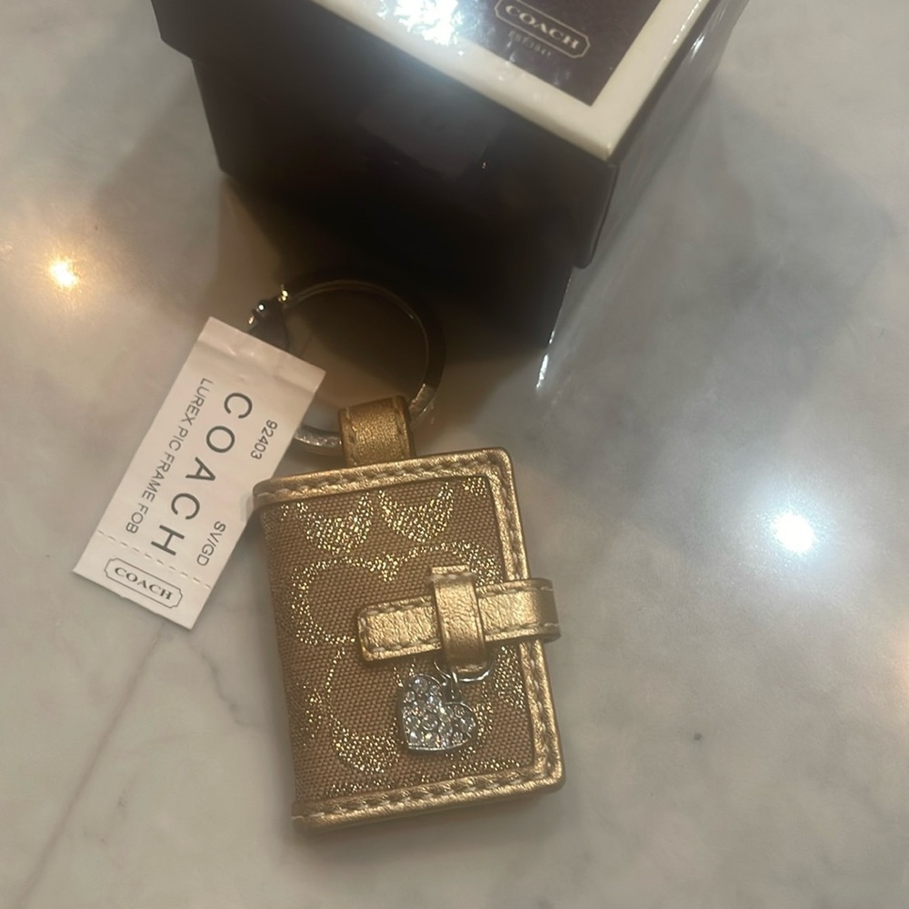 Coach NWT gold with shiny heart key ring fob